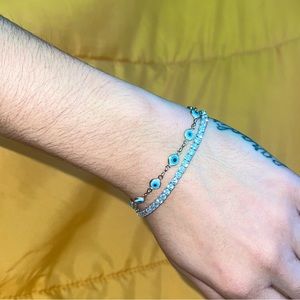 Swarovski Tennis Bracelet for $125. Size adjustable clip.